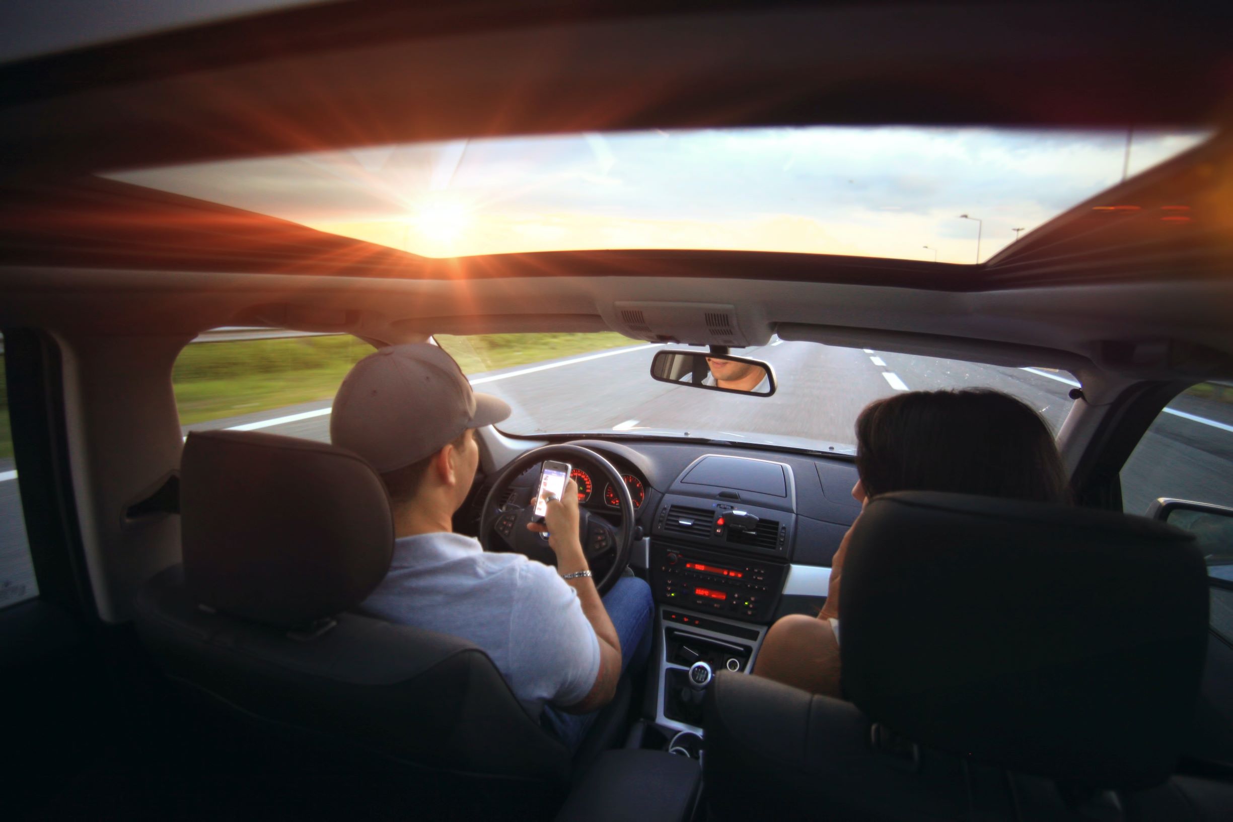 Two men on a car test drive