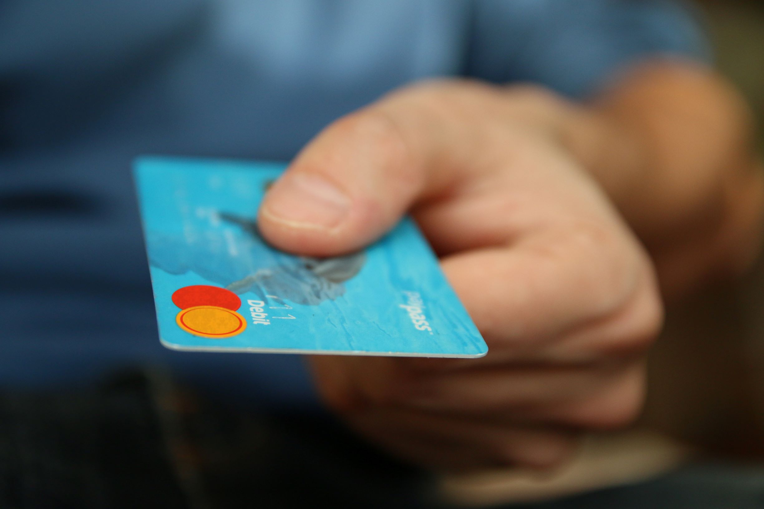 A man making payment using his credit card